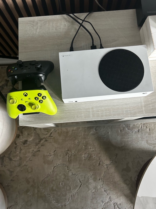 Xbox series S with 2 controllers and charging station