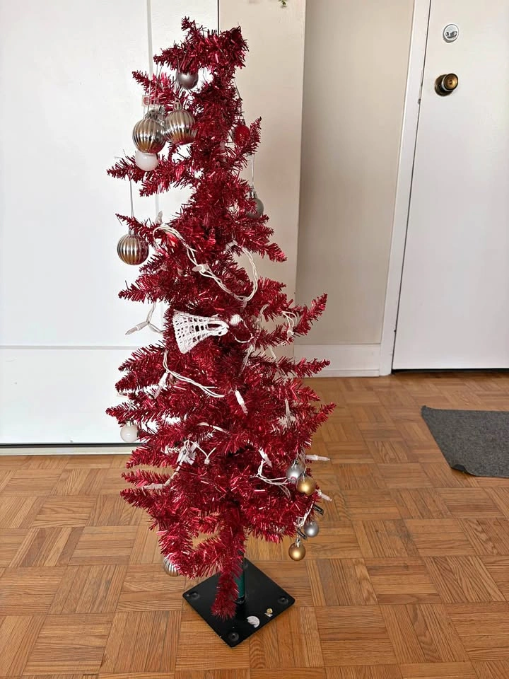 Red Tinsel Christmas Tree with Ornaments and Lights