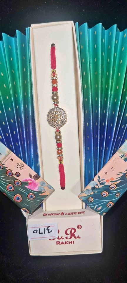 Premium Designer Crystal Rakhi in Royal Peacock Gift Box