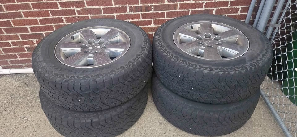265/65R18 GMC LT tires with rims