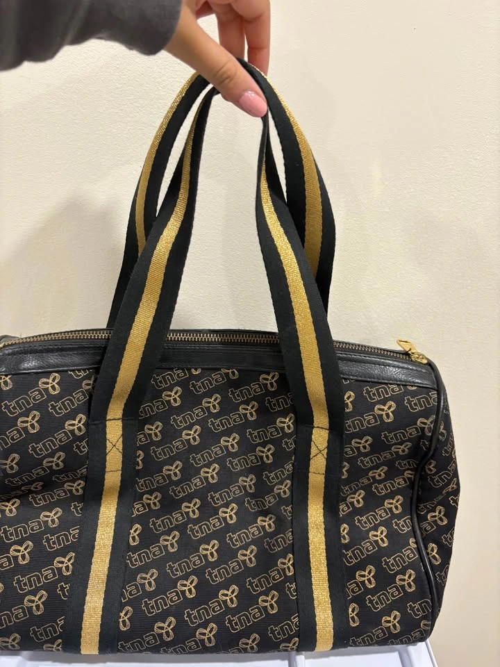 Vintage Aritzia TNA Y2K Black & Gold Duffle Bag - photo 2