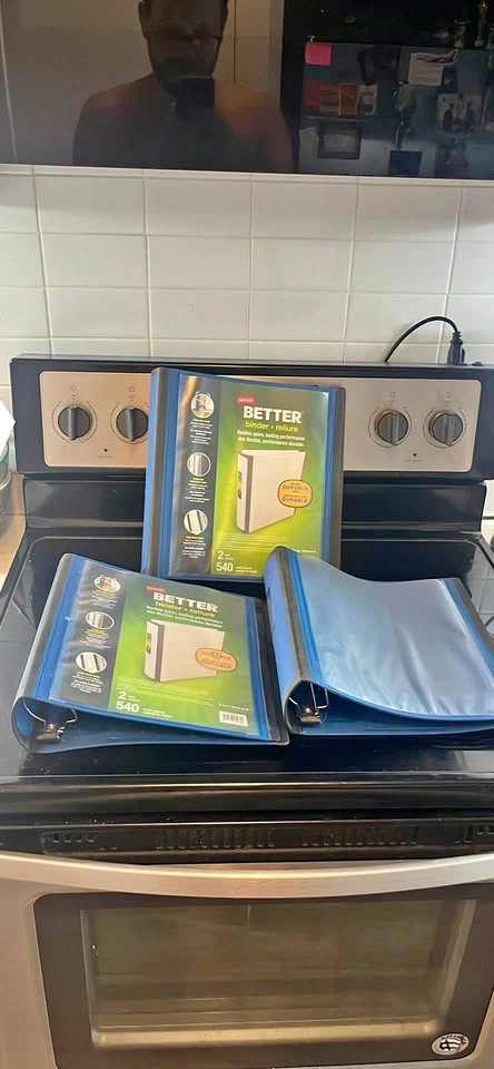 Three 2 inch binders