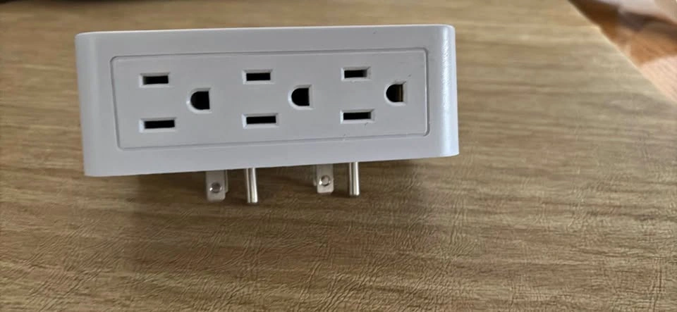 Wall outlet adaptor