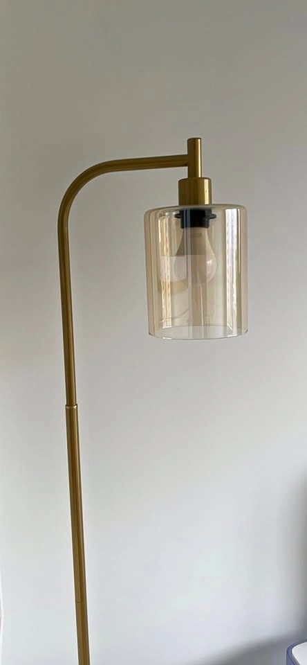 Gold Metal Floor Lamp with Amber Glass Shade