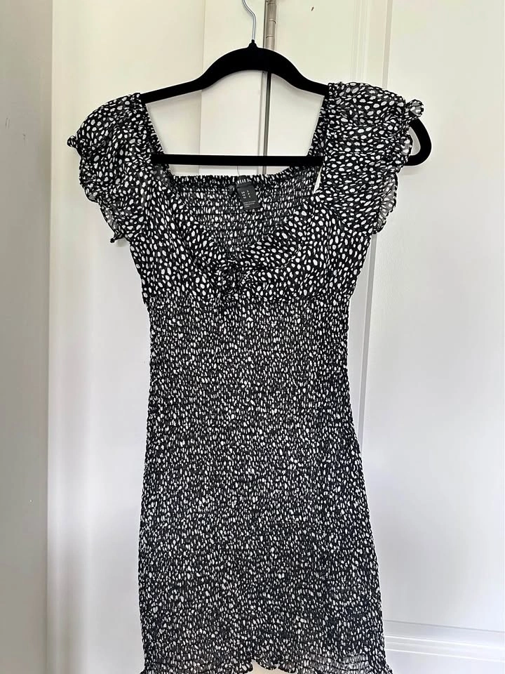 Brand new & never worn dress available in sizes S, M & L