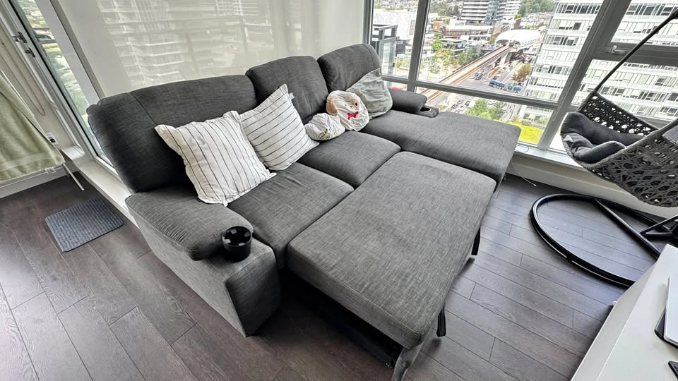 JYSK 100” Sectional Pull-Out Sofa with Storage Chaise