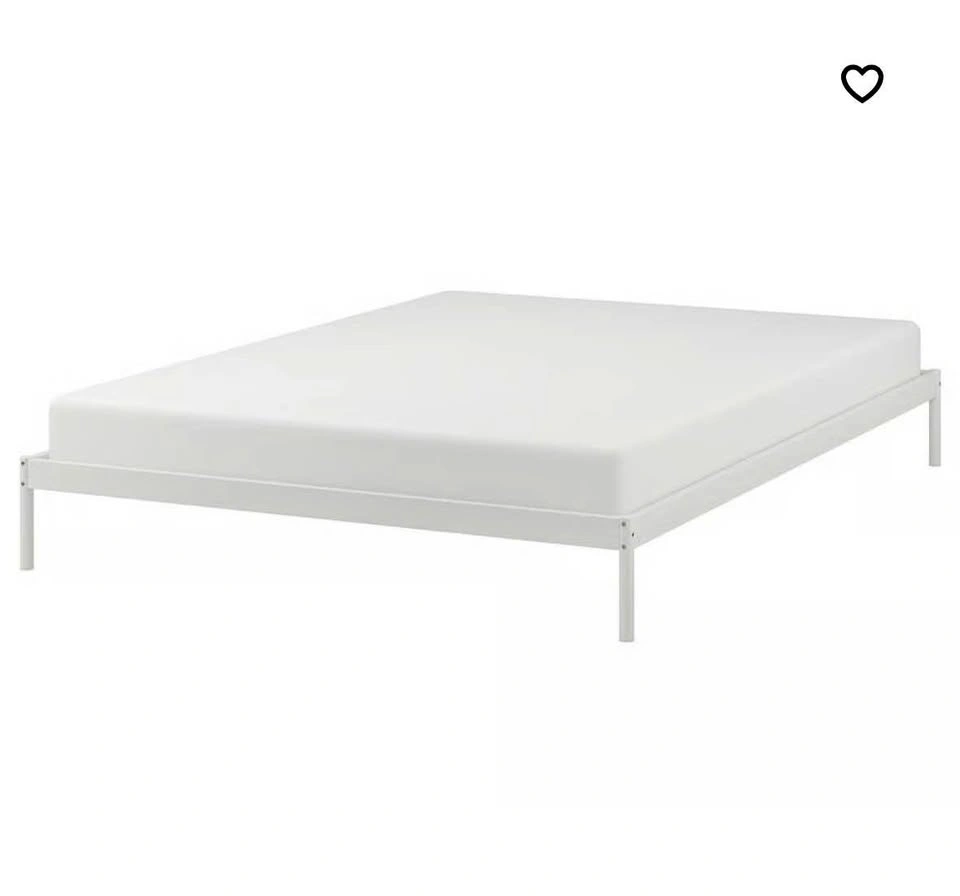 IKEA white metal bed frame with wooden panels
