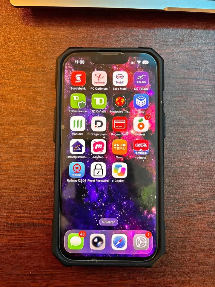 Apple iPhone 13 with UAG and OtterBox Cases