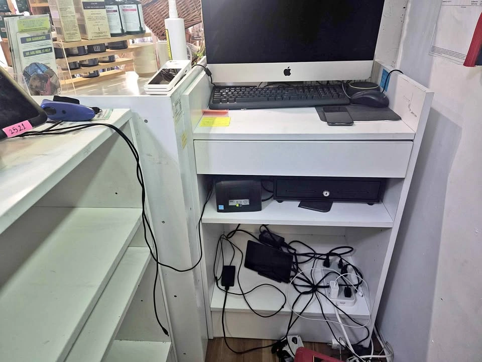L-shape White Retail Checkout Counter with Shelving