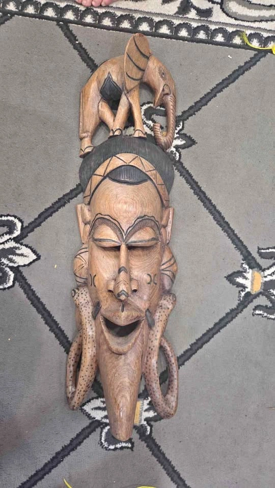 Hand-Carved African Style Wooden Mask with Elephant