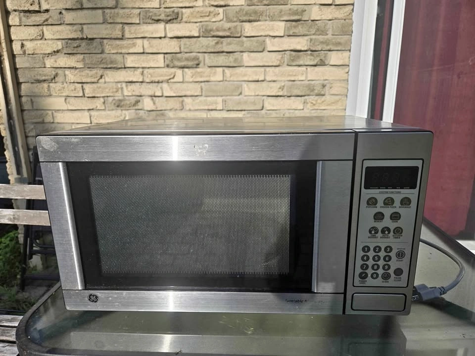 Used Microwave 1100watts - sold as is