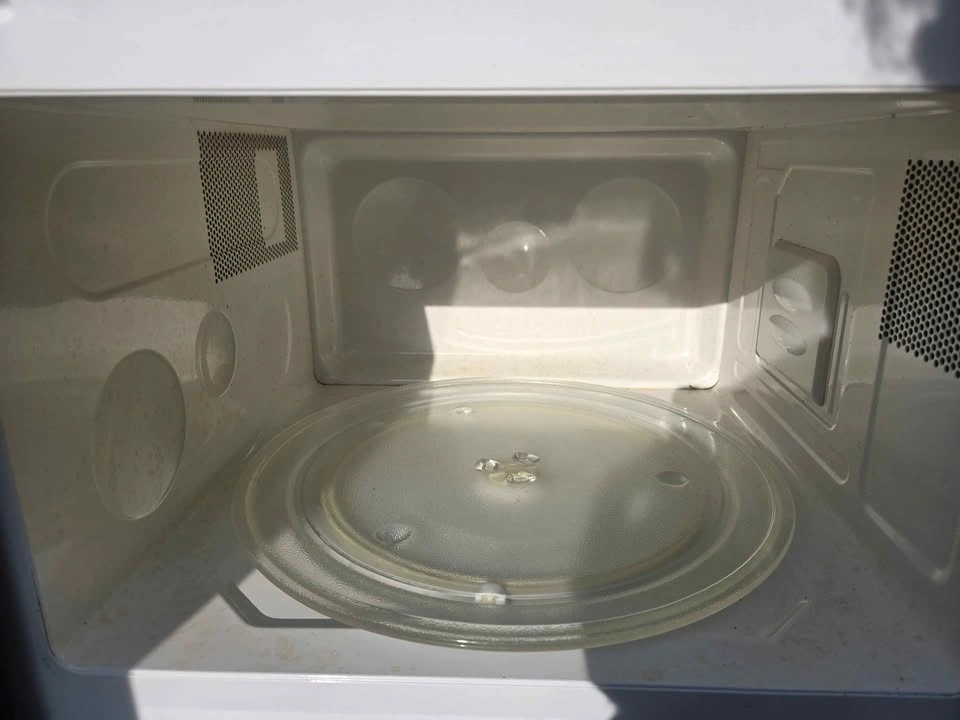 Used Microwave 1100watts - sold as is - photo 2