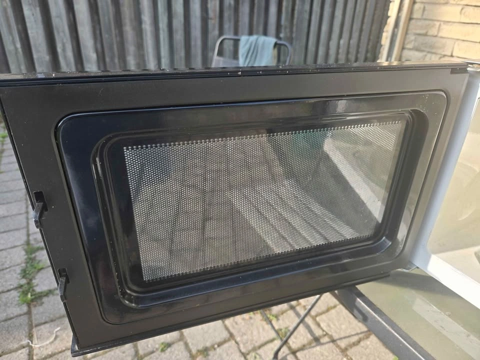 Used Microwave 1100watts - sold as is - photo 3