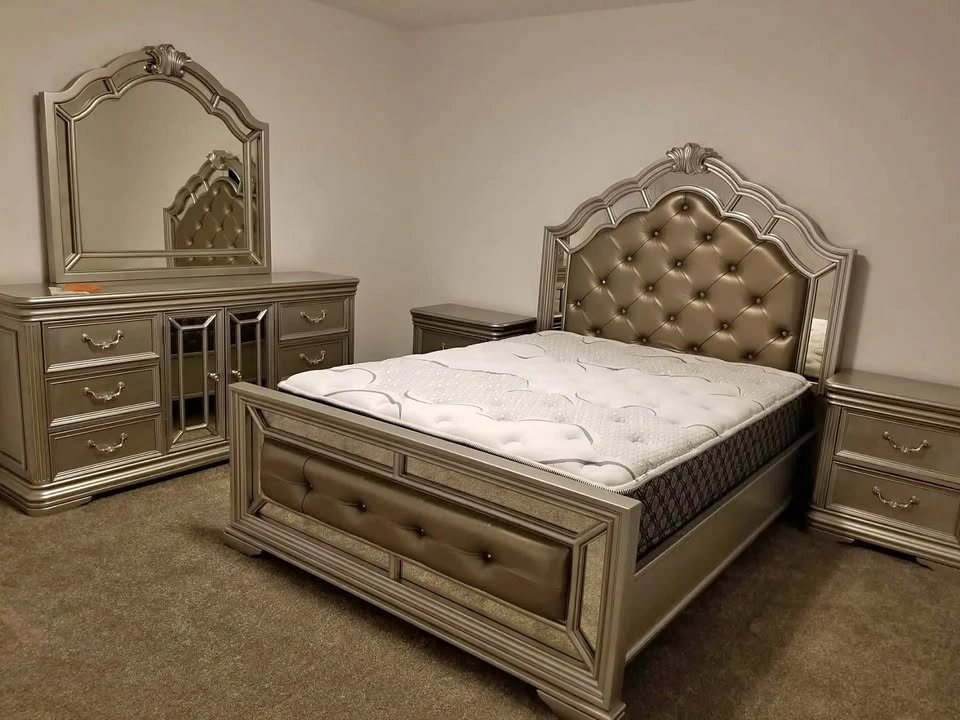 Queen size bed with two side tables and a drawer