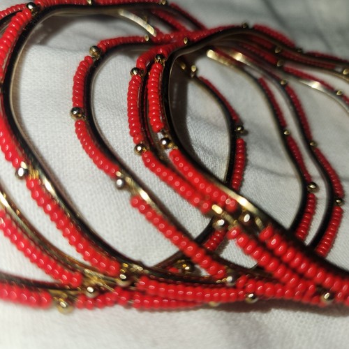 Gold tone and red bead bracelet set of 6
