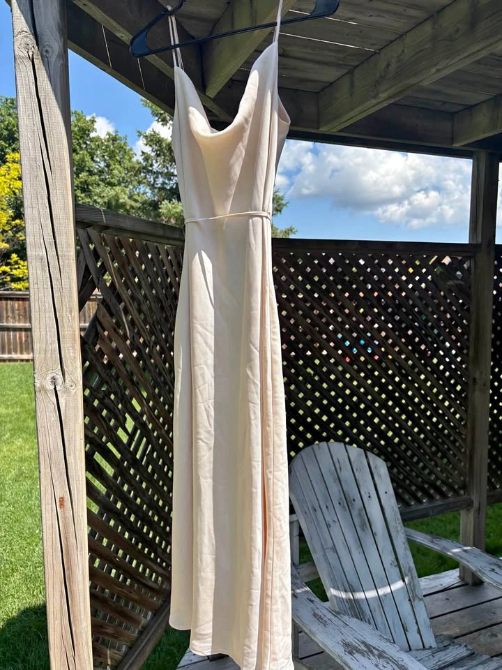 Woman’s wedding guest dress