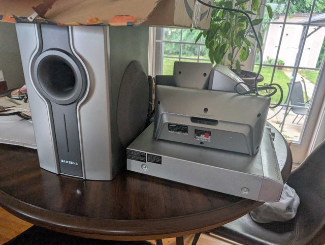 Five Speakers with Surround Sound Amp & DVD Player