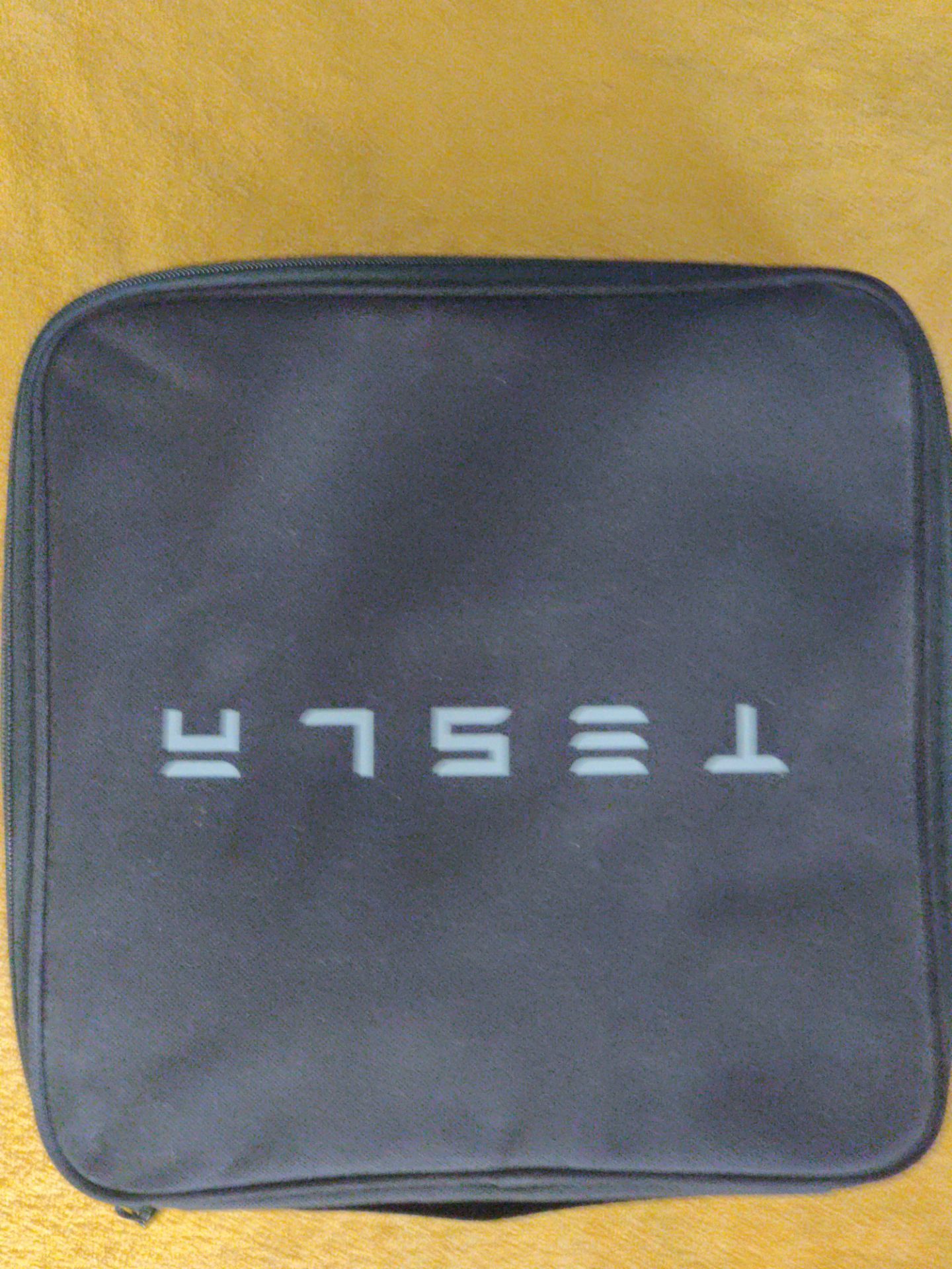 Tesla Charging Cable Carry Bag and charging plug