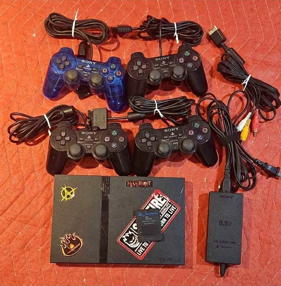 PlayStation 2 Slim Bundle – 4 Controllers + 6 Games