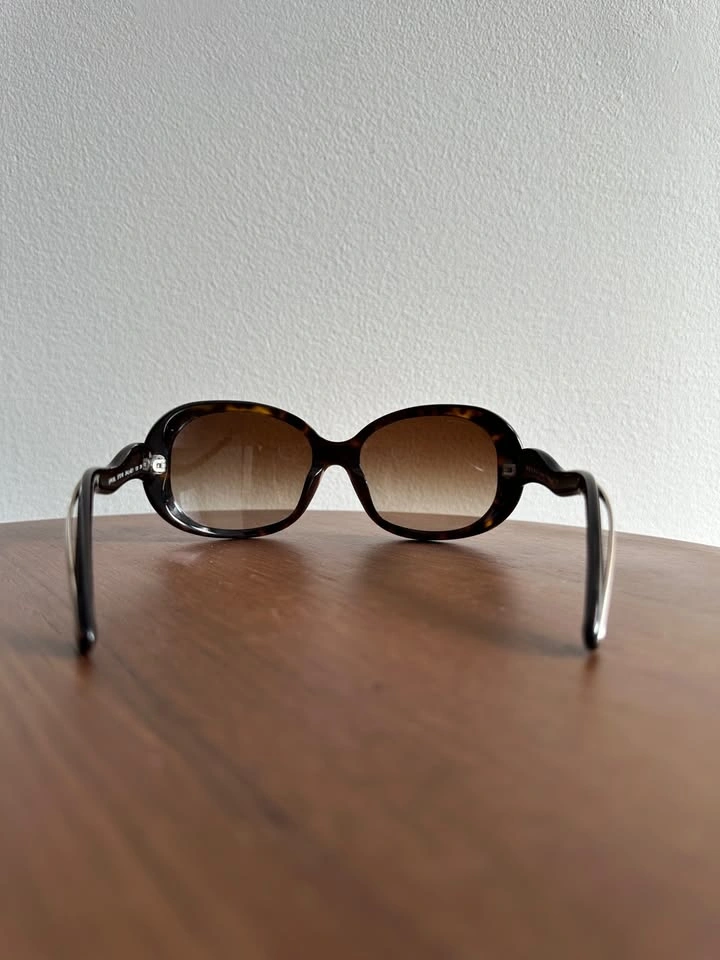 Prada Women’s Sunglasses – Model: SPR08L Like New - photo 5