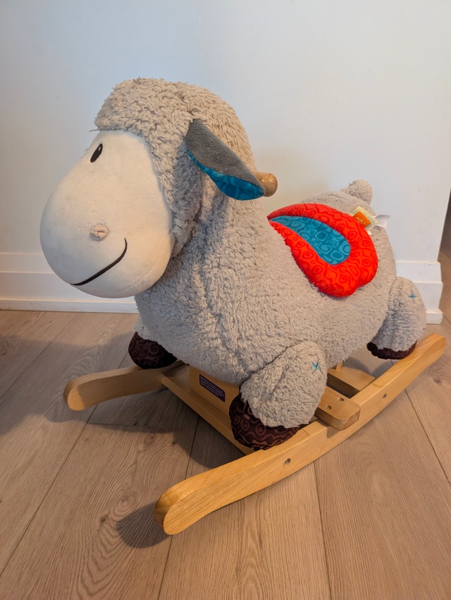 B. Toys rodeo rocker sheep - excellent condition
