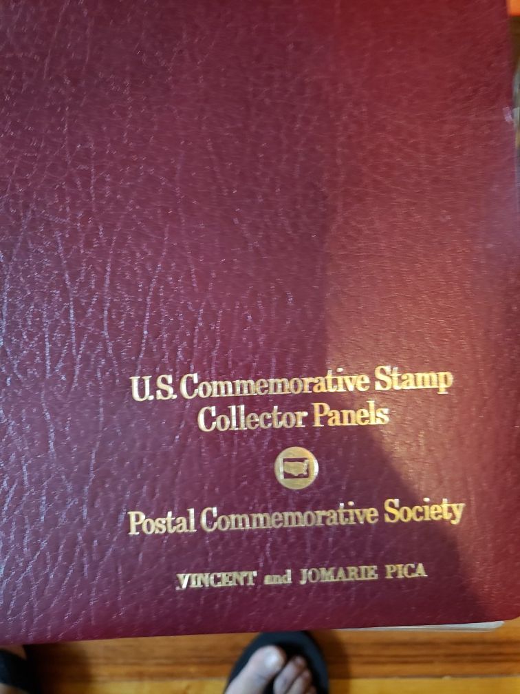 Stamp binder with stamps