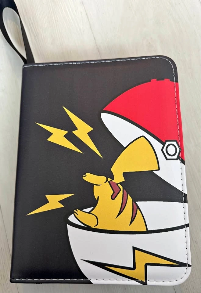 Filled Pokémon card binder