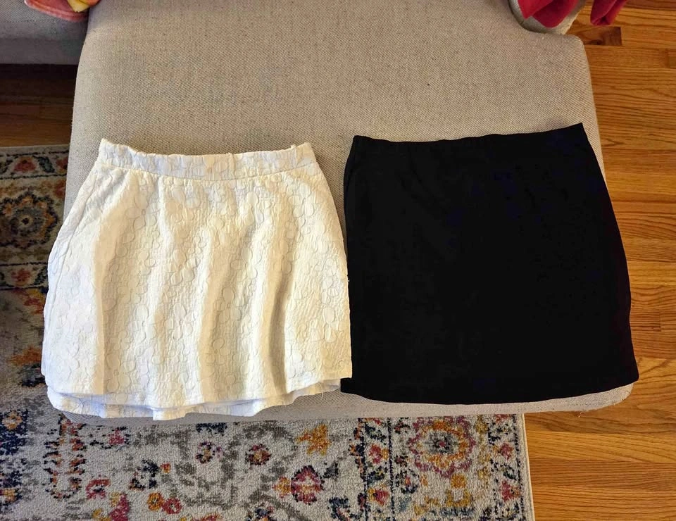 Skirts (mini): White lace and black