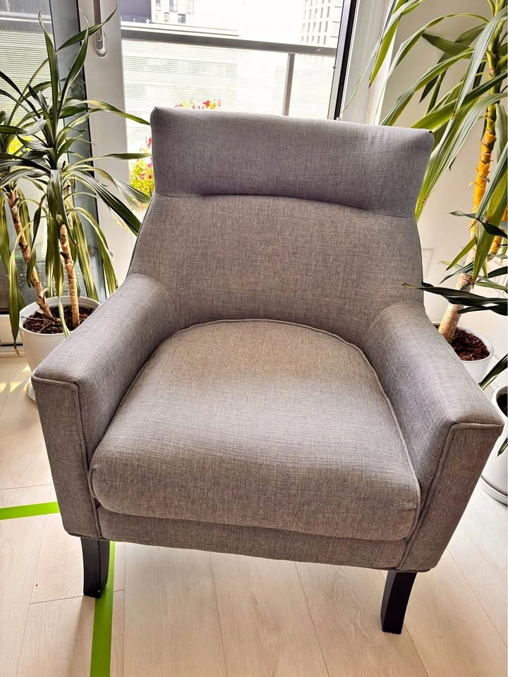 Grey Upholstered High-Back Armchair
