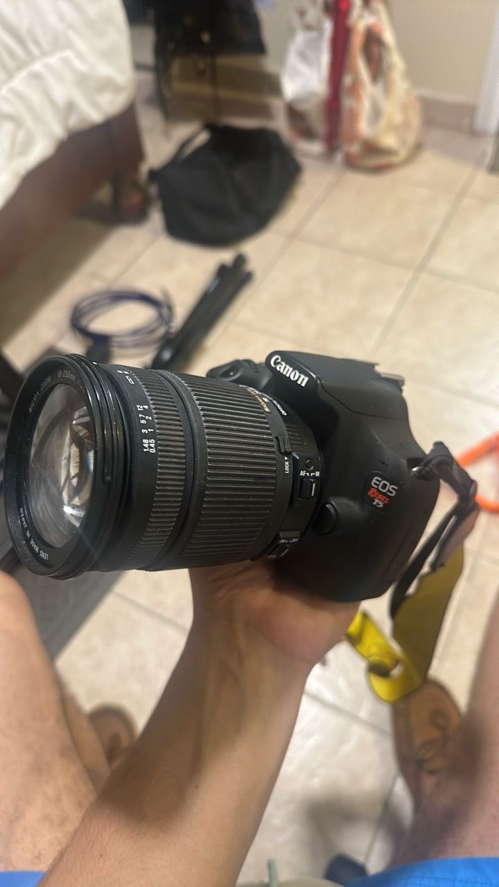 Canon EOS Rebel T5 DSLR with Sigma Zoom Lens