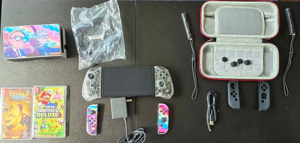 Nintendo Switch OLED Bundle + Games & Accessories - photo 3