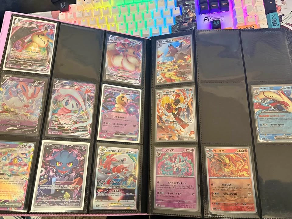 Pokemon binder, poster and tins
