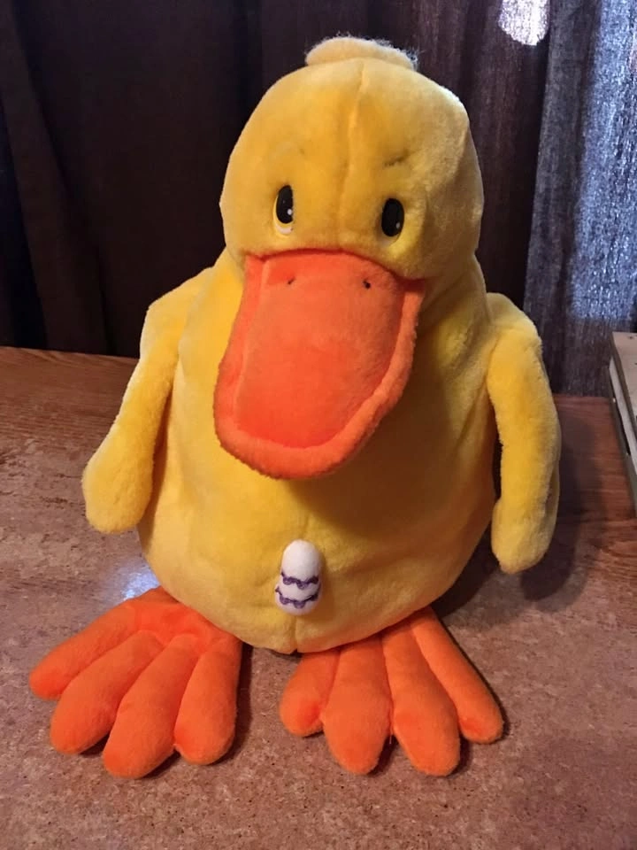 QUACKING TALKING EASTER DUCK PLUSH PLAYS HERE COMES PETER COTTON