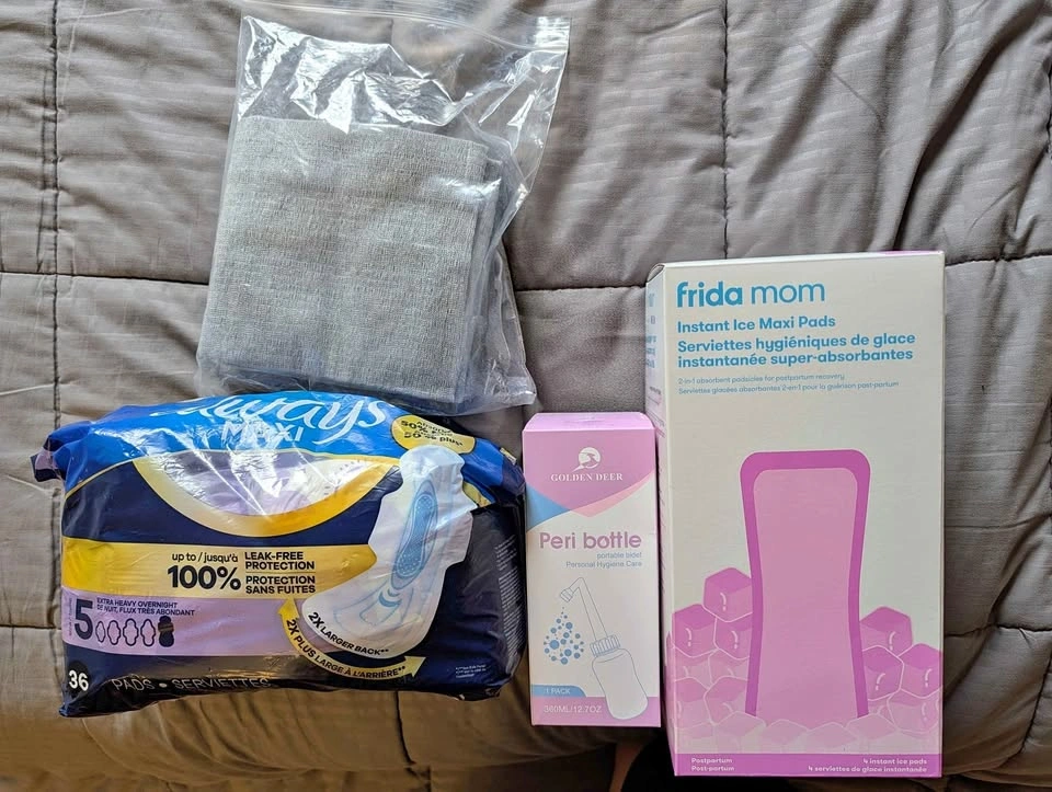 Postpartum items (Frida ice maxi pads, underwear, peri bottle)
