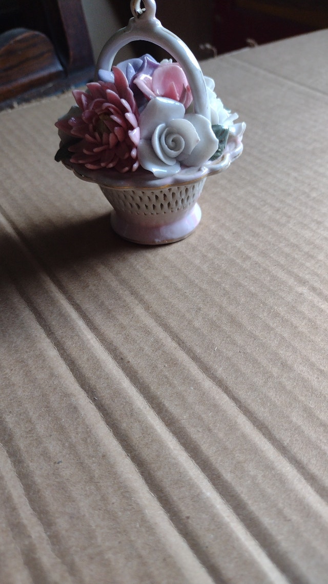 Vintage porcelain basket figurine