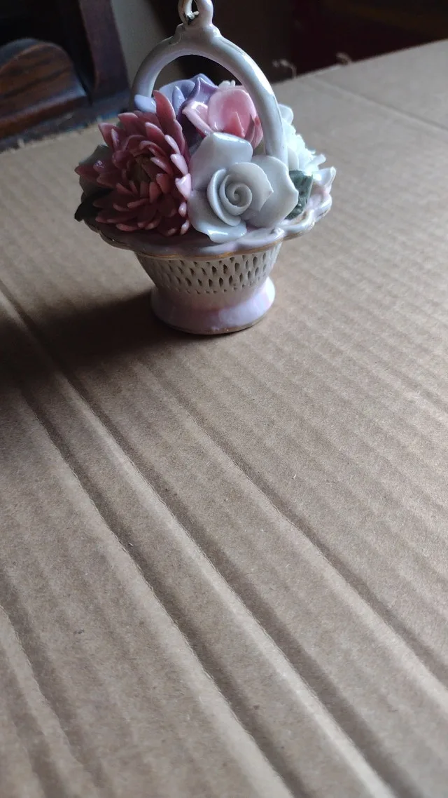 Vintage porcelain basket figurine
