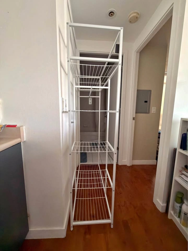 Clothing rack with shelves and hanging space