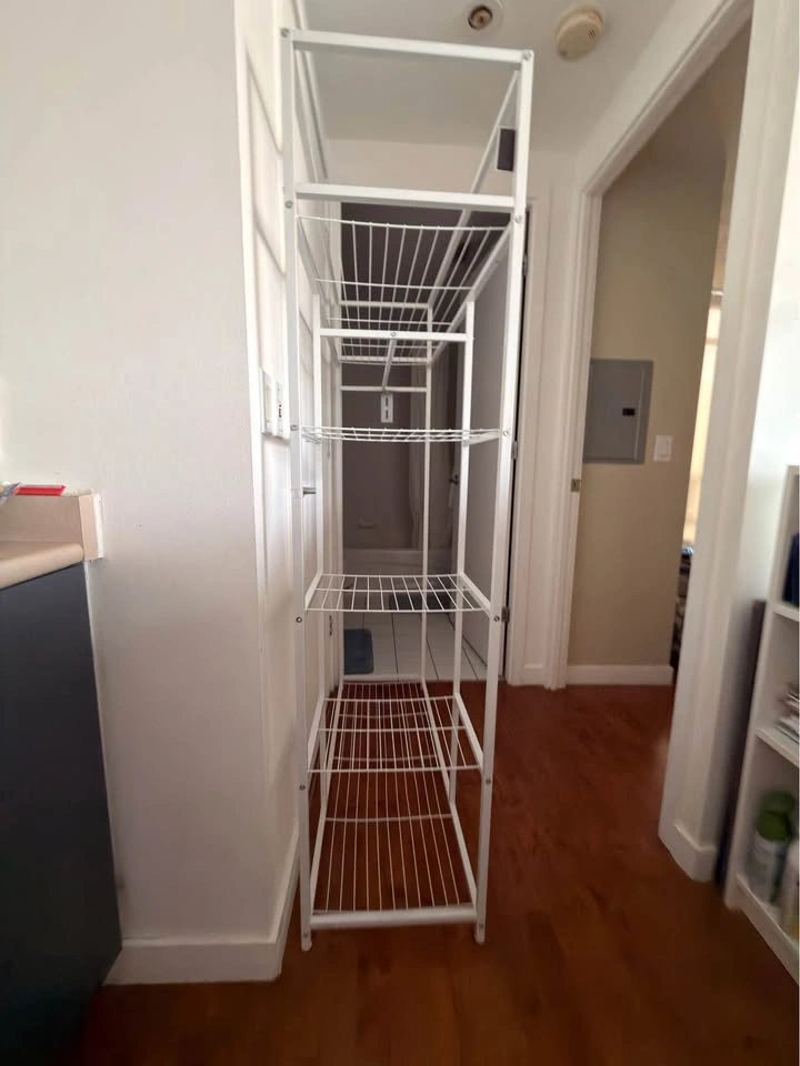 Clothing rack with shelves and hanging space - photo 2