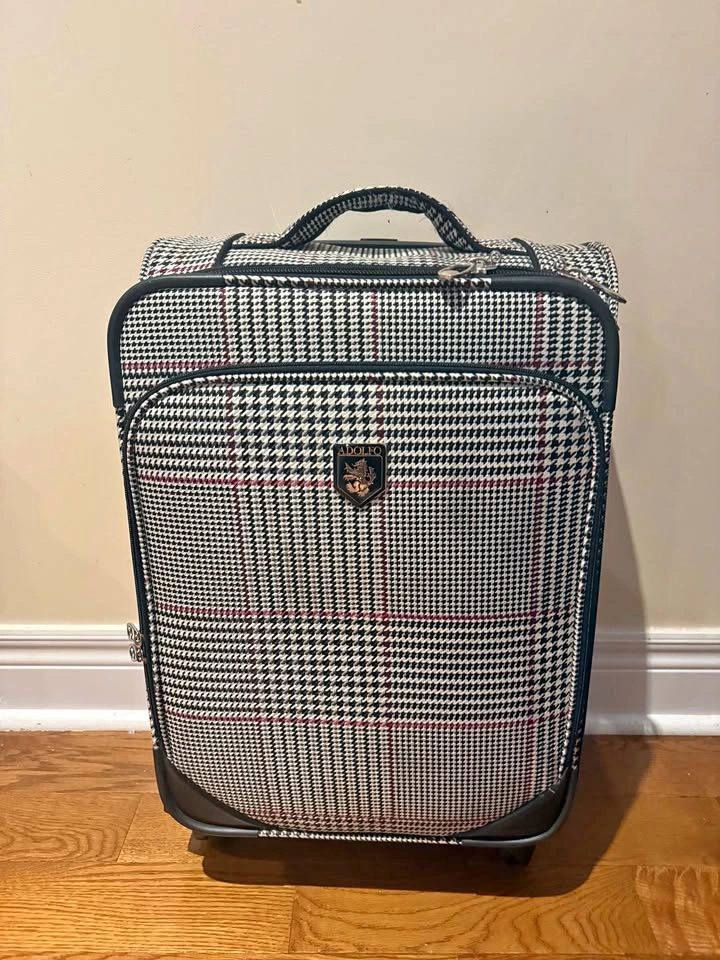 Adolfo travel luggage