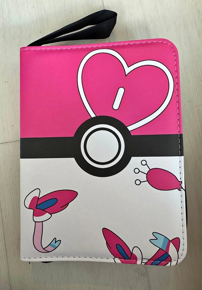 Filled Pokémon card binder