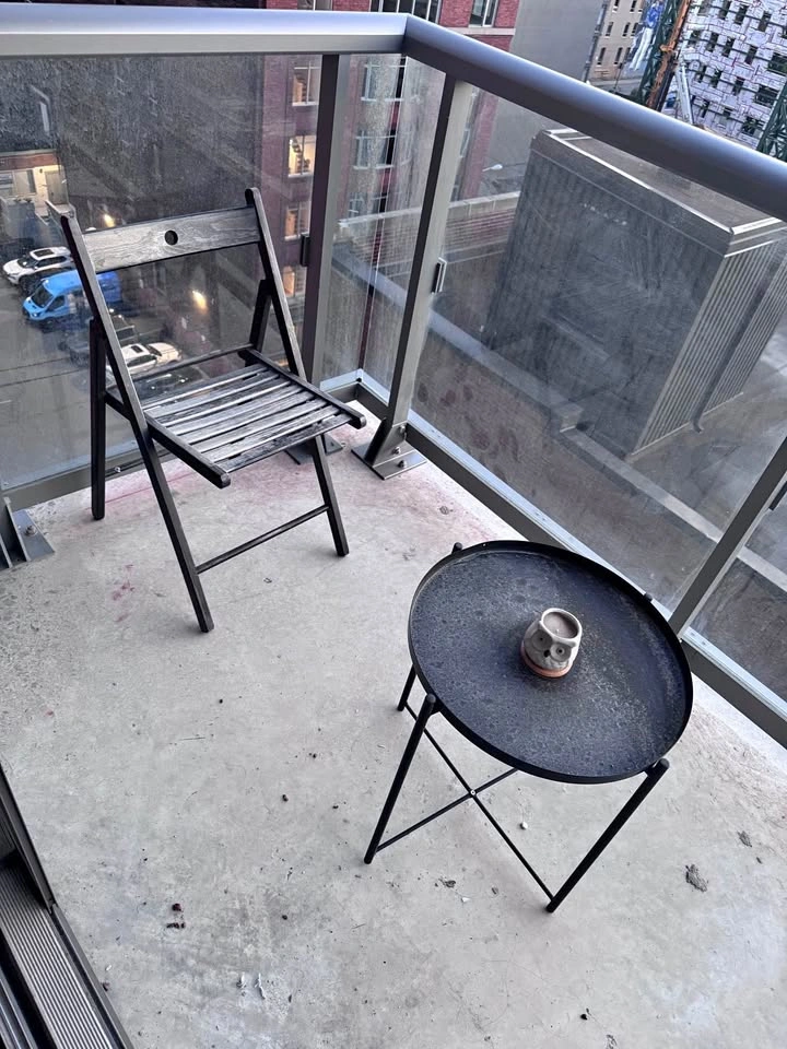 Black Metal Tray Table and Wooden Folding Chair