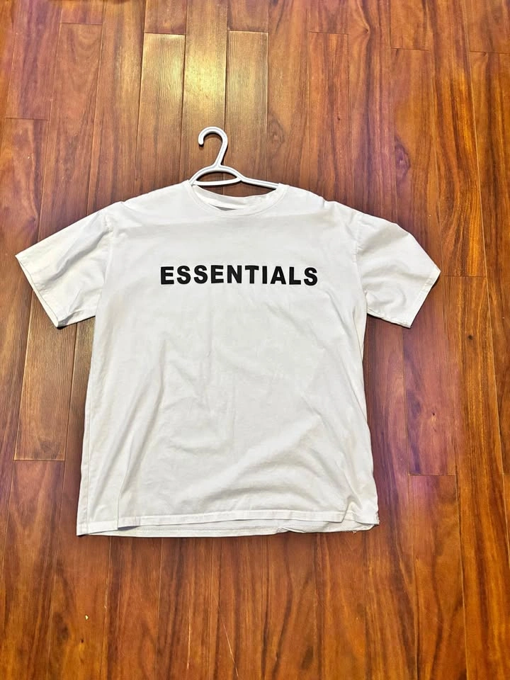 Essentials shirt size large