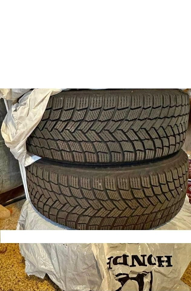 Two 275/40/20 Michelin winter tires 90% tread, like new