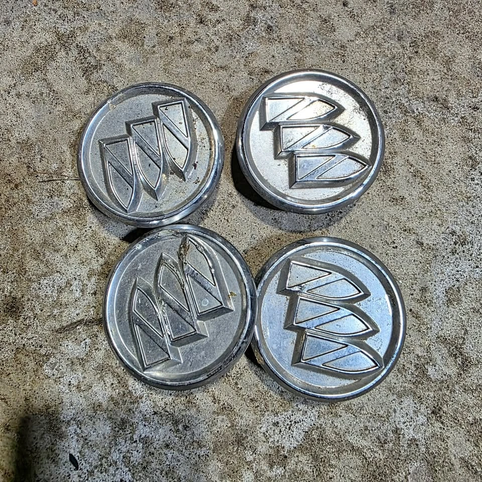 four Buick centre caps