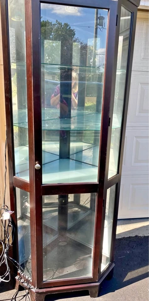 Tall corner curio cabinet
