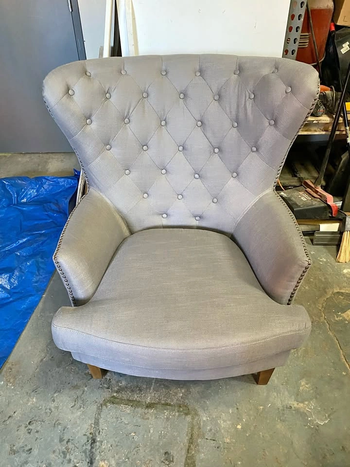 Gray linen wingback chair