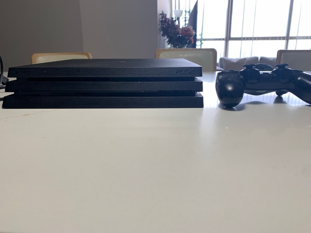 PS4 Pro 1TB Console Bundle w/ 3 Games & Controller - photo 2