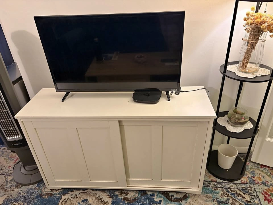 VIZIO Smart TV + White Sliding Door Media Console
