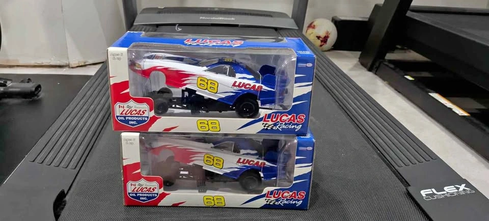 Two Lucas racing cars