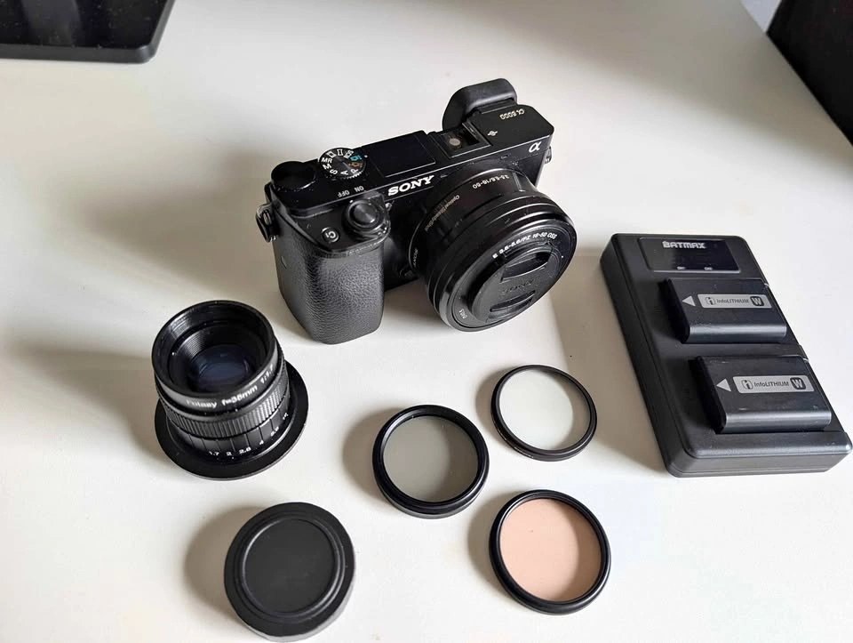 Sony a6000 Camera Bundle: 2 Lenses, Charger, Filters & SD